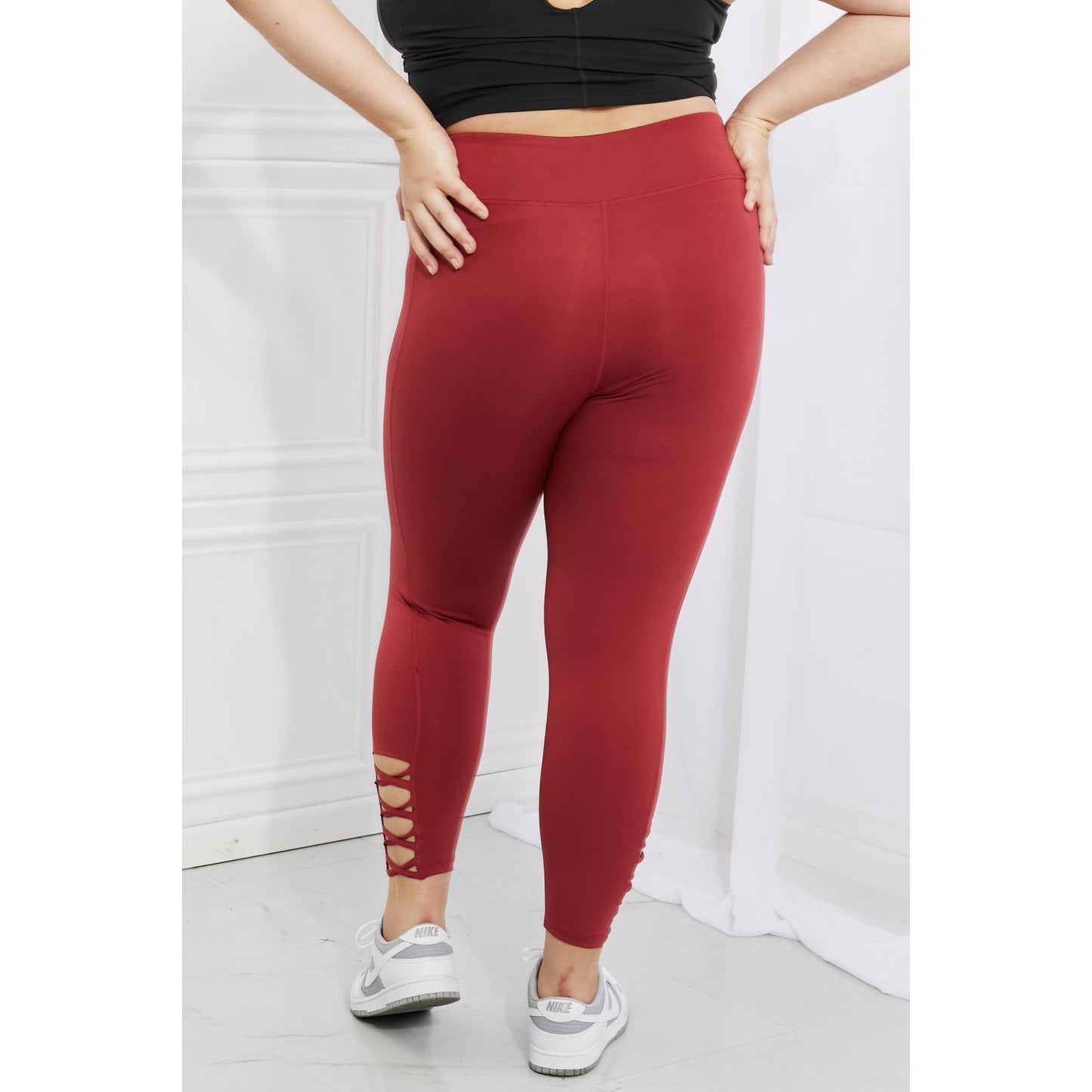 Yelete Ready For Action Full Size Ankle Cutout Active Leggings in Brick Red