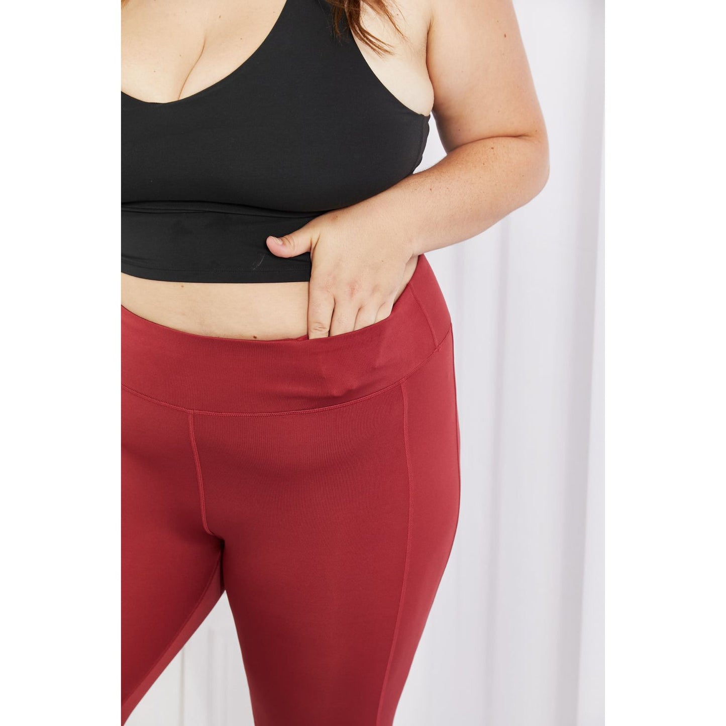 Yelete Ready For Action Full Size Ankle Cutout Active Leggings in Brick Red