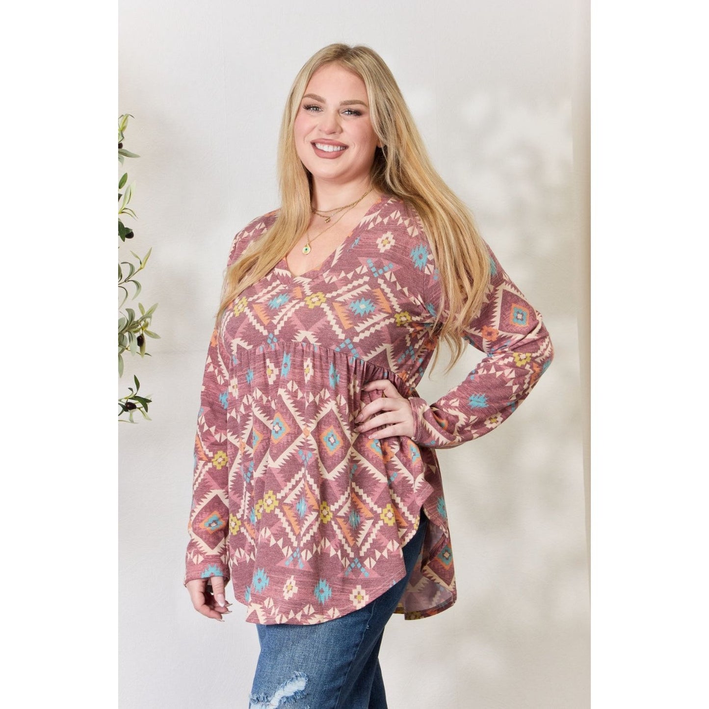 Heimish Full Size Geometric V-Neck Babydoll Top