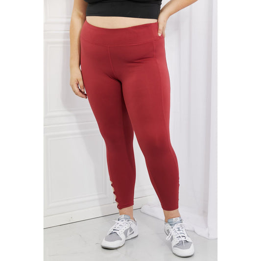 Yelete Ready For Action Full Size Ankle Cutout Active Leggings in Brick Red