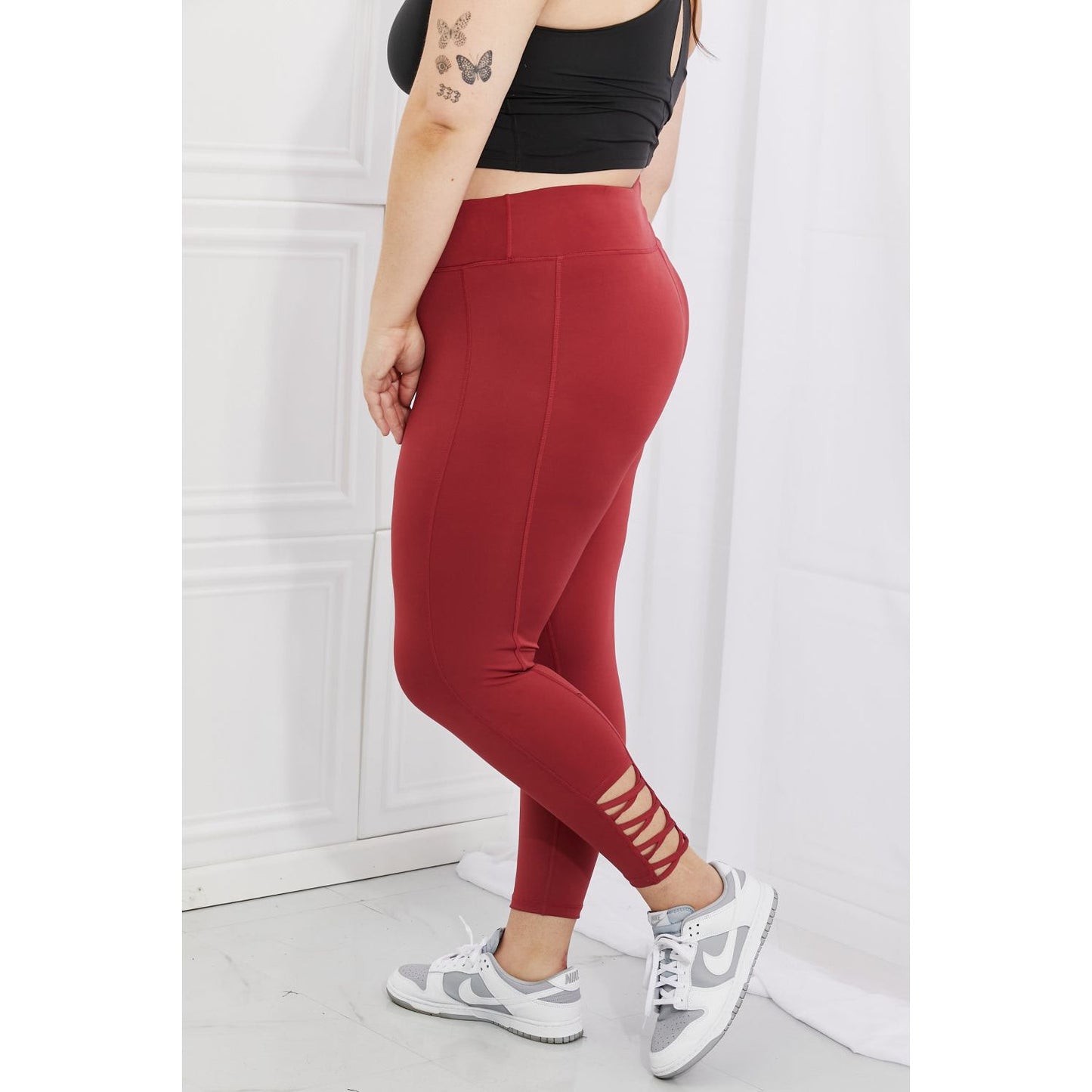 Yelete Ready For Action Full Size Ankle Cutout Active Leggings in Brick Red