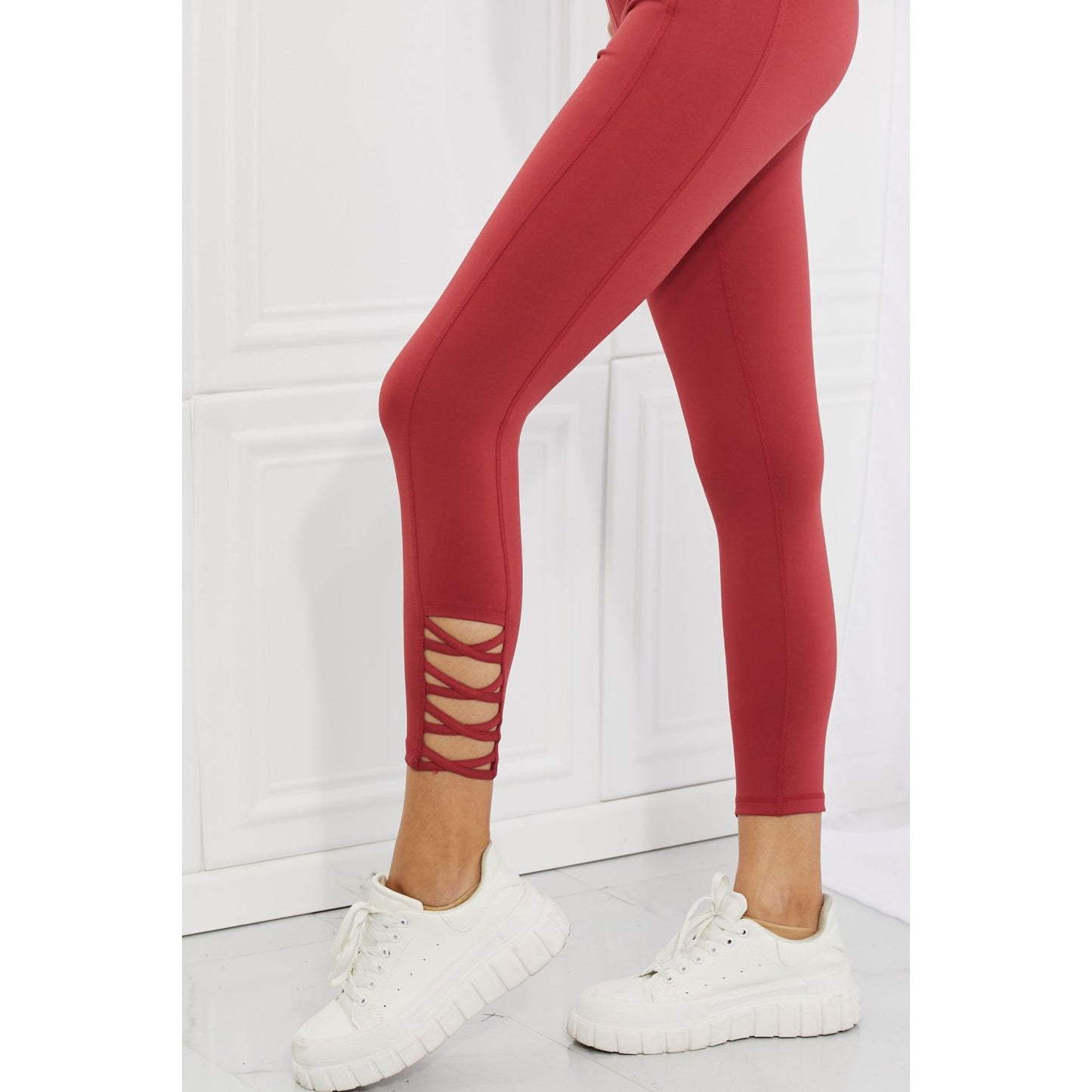 Yelete Ready For Action Full Size Ankle Cutout Active Leggings in Brick Red