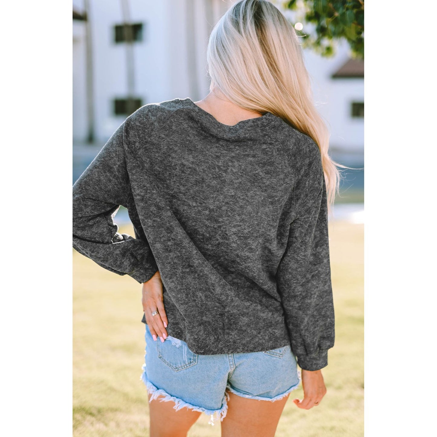 Mineral Washed COW'S FIRST RODEO Round Neck Raglan Sleeve Sweatshirt