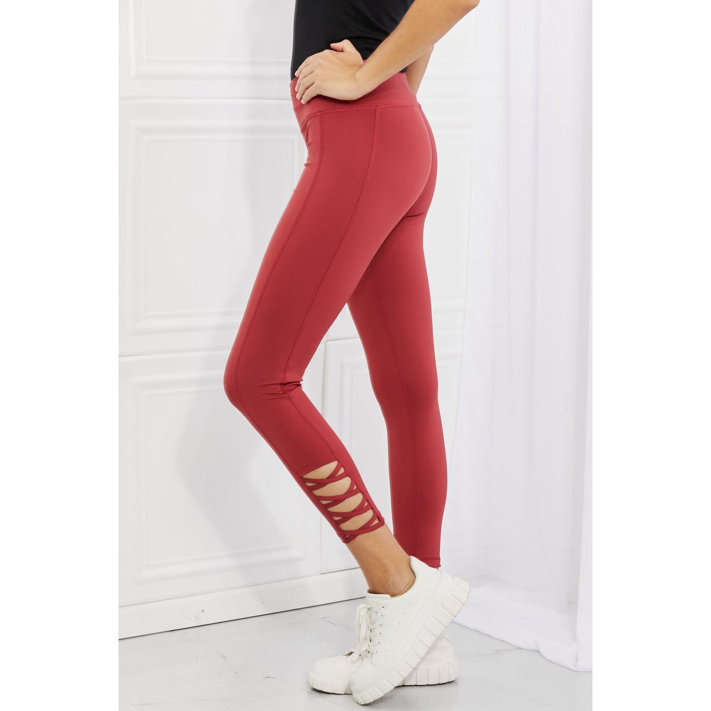 Yelete Ready For Action Full Size Ankle Cutout Active Leggings in Brick Red