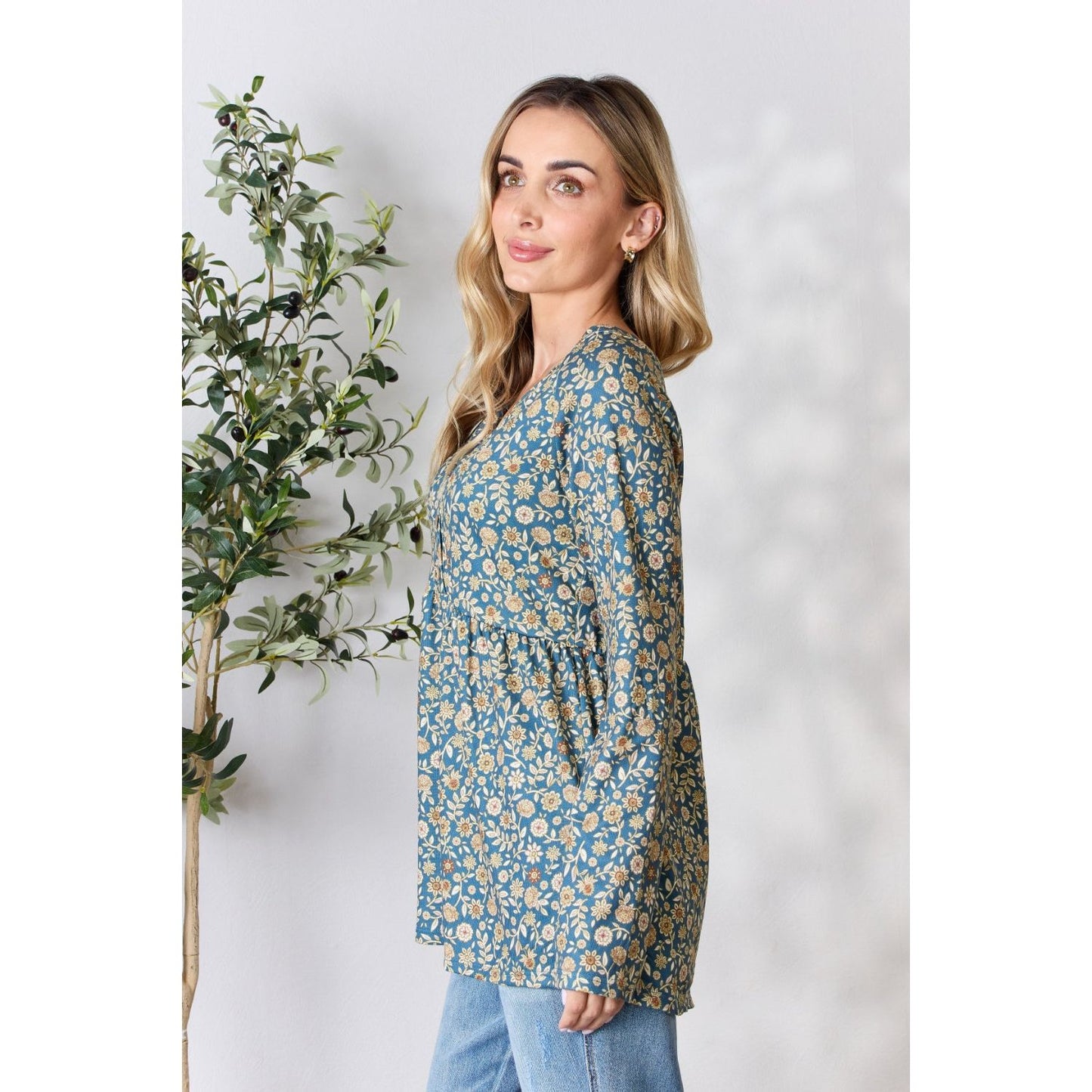 Heimish Full Size Floral Half Button Long Sleeve Blouse